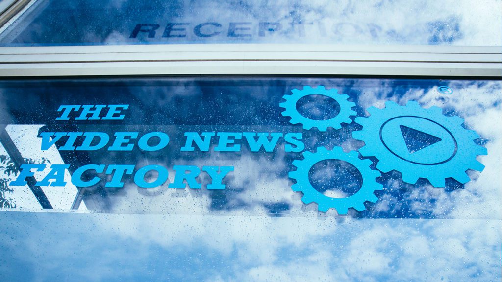 Photo of The Video News Factory's logo in the building